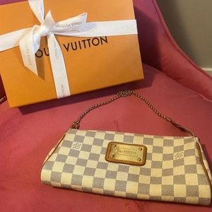Louis Vuitton Eva Clutch with box and dust bag.